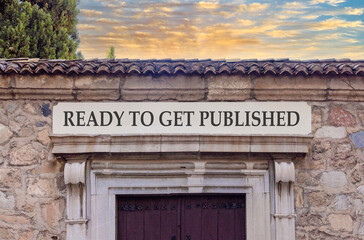 Obraz premium Ready to get published symbol. Concept words Ready to get published on beautiful white sign plate. Beautiful stone wall background. Business ready to get published motivational concept. Copy space