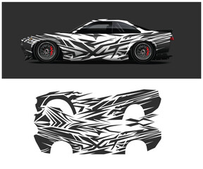 Fototapeta premium Car with unique black and white abstract design decal wrap