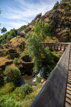 Footbridges and waterfalls on the River Mondego in Videmonte, in the municipality of Guarda, within the Serra da Estrela Natural Park, Portugal.