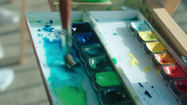 Watercolor paint set which has been used with syntetic brush suitable for painters and Watercolour painting. Artists search for desired color by mixing base paints