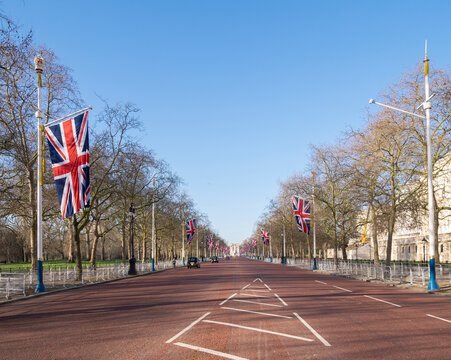 The Mall, Westminster, London. early in the morning, almost empty with very little traffic.