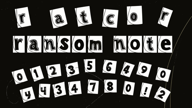 Cut out letters and numbers arranged in a ransom note style black and white composition alphabet characters