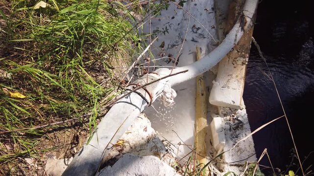  Acid mine drainage from copper mine and lime neutralizing reaction. Flowing toxic waters