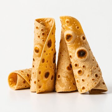 Traditional Indian Rolled Chapati Flatbread Isolated on White Background