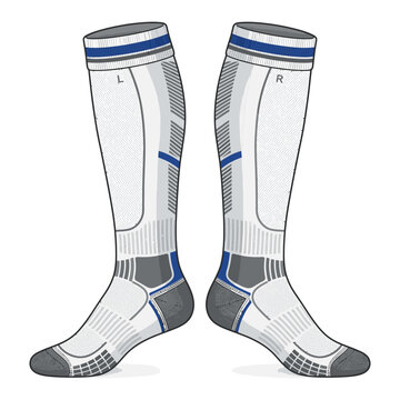 A pair of athletic compression socks for skiing, showing the left and right sock design. The socks are white with blue and gray accents and feature ventilation zones and padded areas.