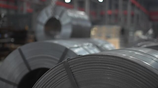 Heavy industry factory metal products metal profile. Metallurgy metallurgical plant metal. Metalworking industry metal coil pipe sheets industrial manufacturing production equipment.