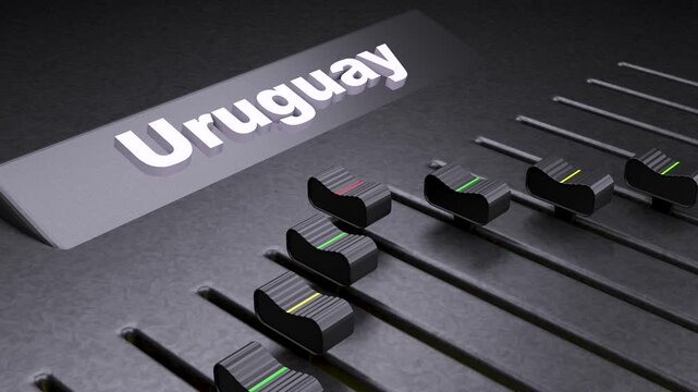 Uruguay text on professional audio mixer, sound board faders moving for Uruguay media production, music studio console with national label