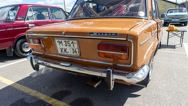VORONEZH, Russia - April 25, 2026.Classic ochre yellow VAZ Zhiguli displayed at a car gathering in Russia showcasing retro design and vintage appeal