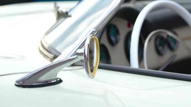 Side View Mirror of a Vintage Classic Convertible Car Close Up
