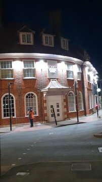 Low Angle Illuminated Streets View of Luton City of England United Kingdom After Sunset Night. Wide Angle Camera Footage Was Captured During Walk at Night of June 27th, 2026. 