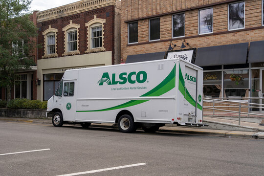 Tallahassee, Florida,  USA - February 11, 2022: An Alsco Uniforms delivery truck on the street in Tallahassee, Florida,  USA. Alsco Uniforms is an American laundry, linen, and uniform rental company. 