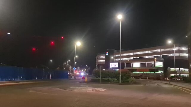 Low Angle Illuminated Streets View of Luton City of England United Kingdom After Sunset Night. Wide Angle Camera Footage Was Captured During Walk at Night of June 27th, 2026. 