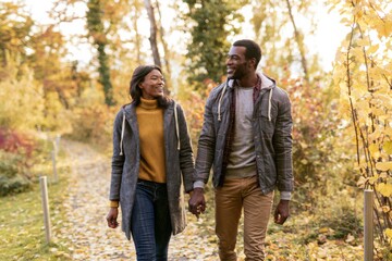 Fototapeta premium Romantic Couple Enjoying Conversation During Fall Walk