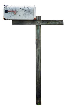 Isolated old mailbox on wooden post
