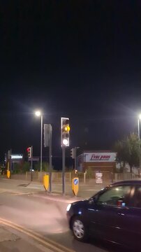 Low Angle Illuminated Streets View of Luton City of England United Kingdom After Sunset Night. Wide Angle Camera Footage Was Captured During Walk at Night of June 27th, 2026. 