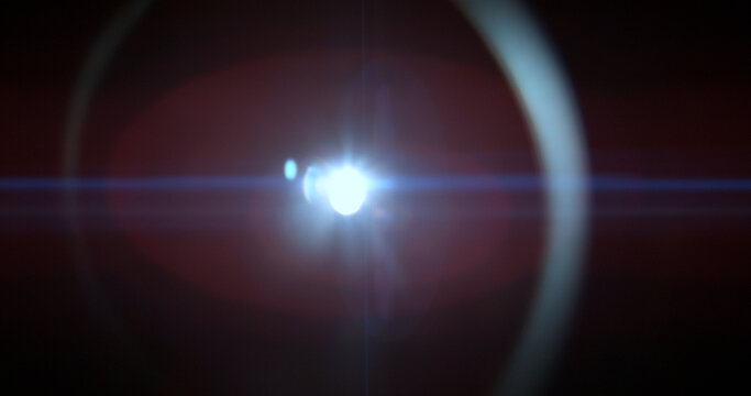 Blue anamorphic lens flare overlay featuring cinematic horizontal light streaks, soft optical reflections and subtle glow on a black background. Premium VFX element for compositing and film editing.