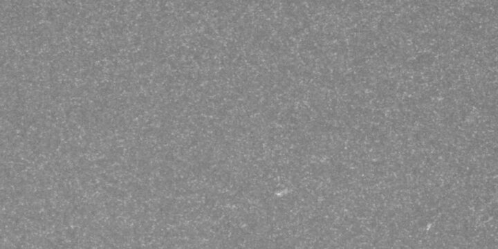 A raw and textured abstract animated background featuring heavy grey film grain and digital noise.
