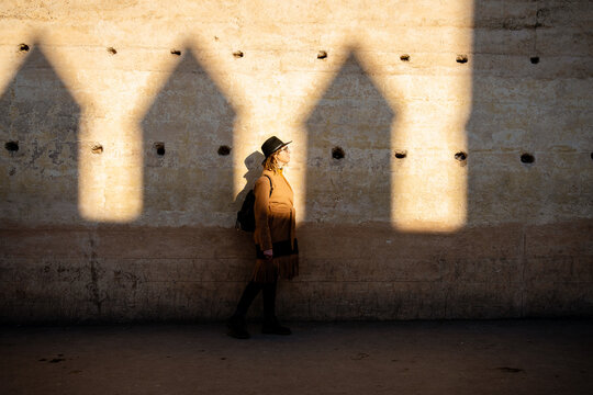A woman visiting a fortress in Morocco