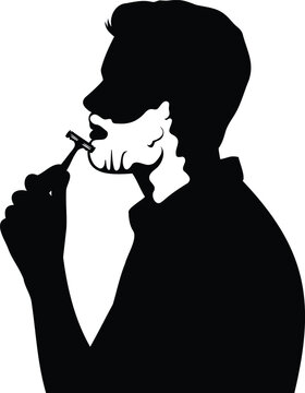 Profile silhouette of a man shaving his beard using a razorblade for daily grooming and hygiene