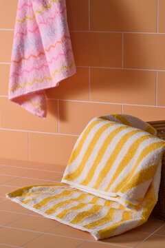 Soft terrycloth towels with vibrant stripes and zigzags