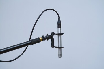 close up of a microphone on boom pole © Gaetan