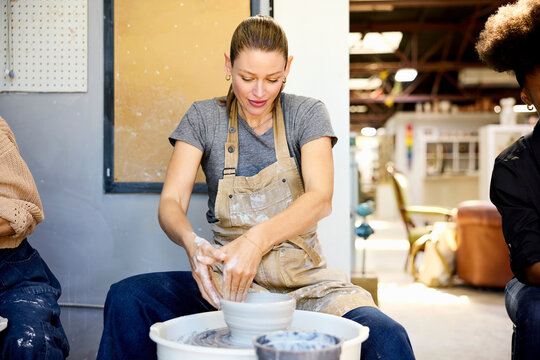 Crafting Clay Bowls in a Workshop