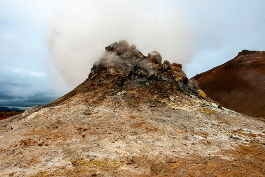 Geothermal landscape with steaming fumaroles at Namaskard Iceland