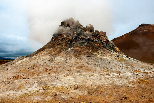 Geothermal landscape with steaming fumaroles at Namaskard Iceland