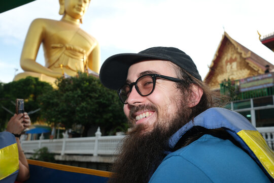Tourist Smiling on Bangkok Boat