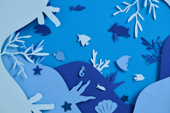 A vibrant and creative ocean-themed in paper cutout style