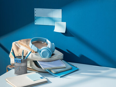A collection of study supplies, organized desk space