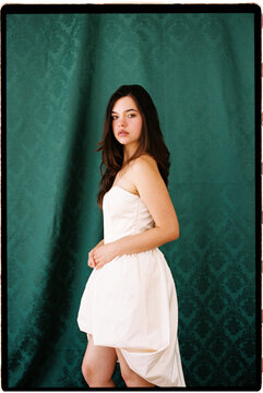 Woman modeling elegant white dress