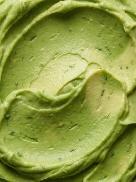 Guacamole avocado puree texture background close up