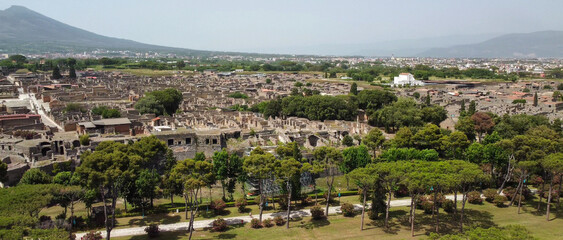 Fototapeta premium Crystal clear drone view of Pompeii ruins and surrounding