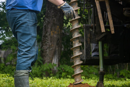 engineering geological surveys, environmental soil analysis, a drill drills into the soil	