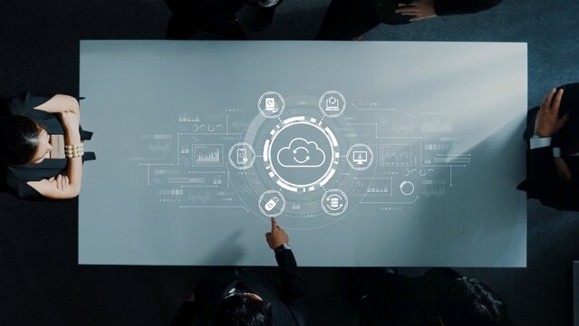 Collaborative Business Meeting Focused on Cloud Technology Visualization with Digital Graphics and Diverse Professionals Engaging in Discussion. Entropy.