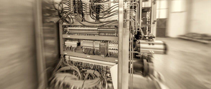 Rack cables in industrial environment. Zoomed view, technology and connectivity concept