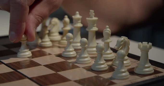 close up of chess pieces during a game