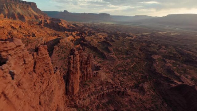 Aerial View of Red Rock Canyon Spires and Valley in Moab During Sunset
