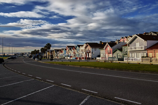 Seafront and traditional houses in Costa Nova, Portugal.