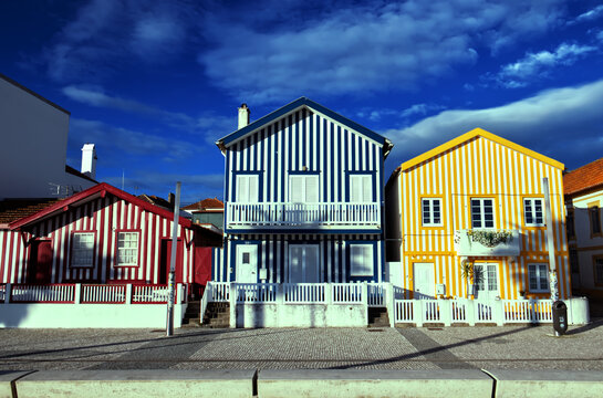 Seafront and traditional houses in Costa Nova, Portugal.