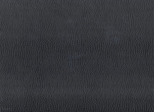 Pebbled leather relief covers a muslin backed surface with closely packed marks, joining fabric grain and pattern for pigment rubbing collage details material reference work plus painted textures