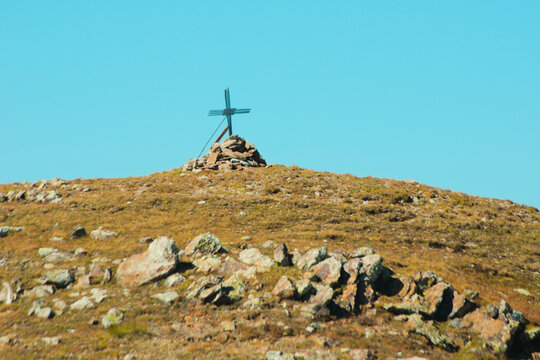 The cross on the top of Mount Masoni, a destination for hikers in the Orobie Alps, Lombardy, Italy