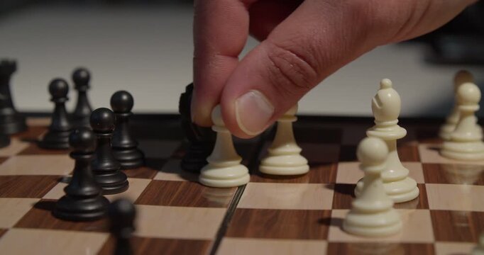 close up of chess pieces during a game