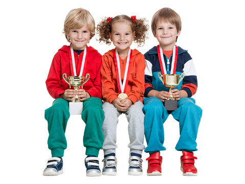 Group of happy kids sitting with trophies and medals isolated on transparent or white background, png