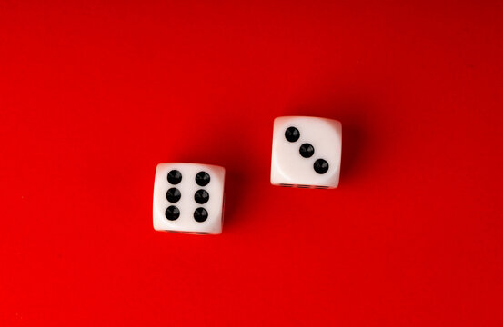 White game dice with black dots