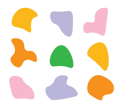 Collection of colorful organic blob shapes on white background. Colorful abstract shapes in playful pattern.