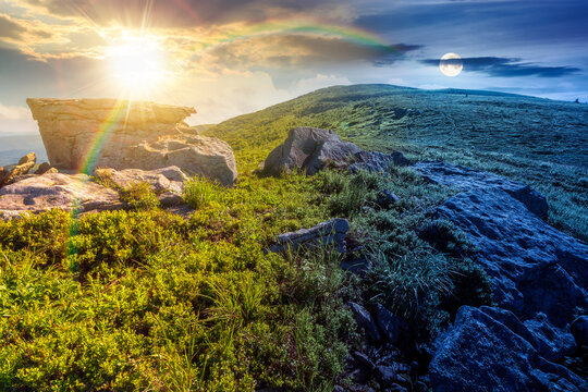 mountain landscape on summer solstice. day meet night. beautiful outdoor scenery of carpathian mountains. sun and moon over grassy slopes with rocks. astrology image for ukraine travel concept