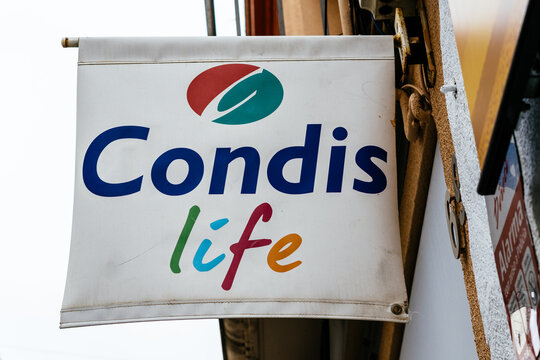 Barcelona, Spain - April 11, 2021. Logo and facade of Condis, Catalan supermarket chain founded in 1961
