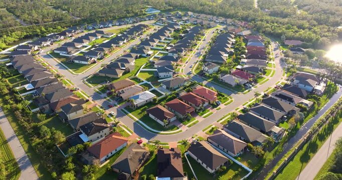 Large residential homes in southwest Florida gated community. American houses in rural US suburbs.